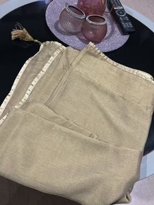 Elegant Golden Saree with Embellishments