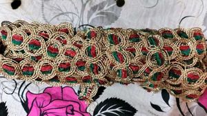 Embroidered golden green red lace