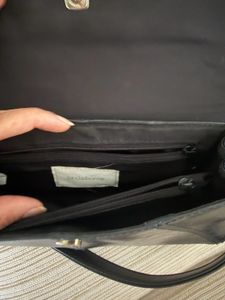Chic Black Shoulder Bag with Chain Detail