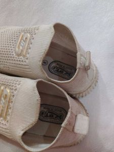 Skechers White Slip-On Sneakers