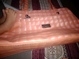Chic Peach Textured Handbag