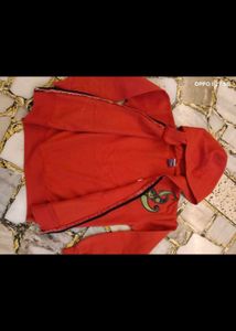 23. Red Zip-Up Hoodie with Paisley Design