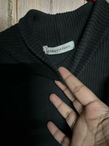 Chic Black Ribbed Turtleneck Top