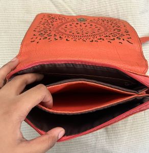 beautiful orange sling bag
