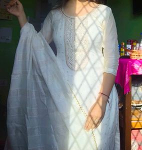 Elegant White Kurta Set with Embellished Neckline