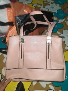 Stylish Pink Handbag with Multiple Compartments
