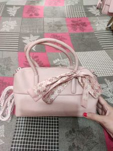 Chic Pink Handbag with Scarf Accent