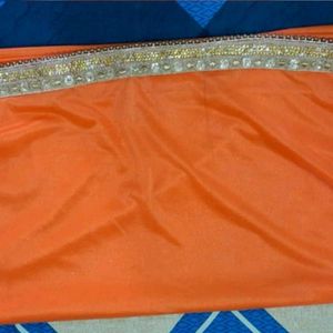 Sparkling Orange Saree with Golden Border ✨