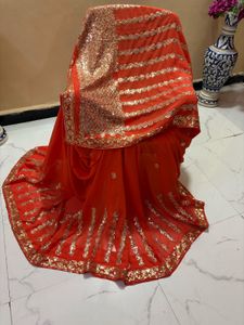 Vibrant Orange Sequined Saree
