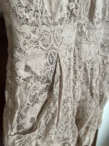 Net Jumpsuit With Bottons In Front To Open