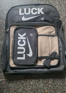 Stylish Black Backpack with "LUCK" Logo
