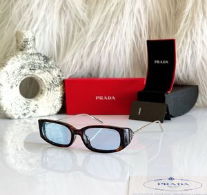 Prada Tortoiseshell Sunglasses