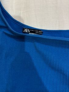 Zara’s Electric Blue One-Shoulder Top