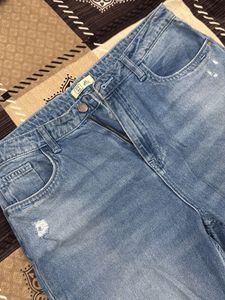 Light Blue Distressed Denim Jeans