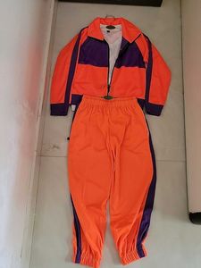 Bright Orange Joggers with Purple Stripes