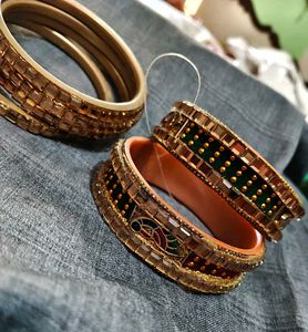 Set of Golden Bangles with Green Embellishments