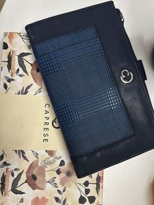 Caprese bifold wallet with zipper compartment