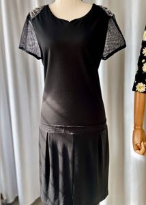 Chic Black Dress with Sheer Sleeves