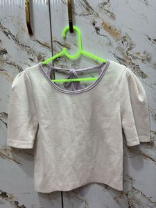 Chic Textured Knit Top with Bow Detail