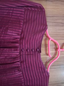 Stylish Burgundy Blouse with Striped Detail