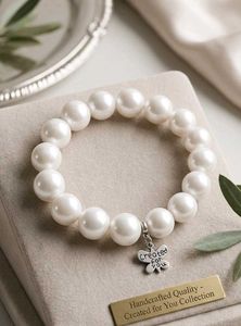 Elegant Pearl Bracelet with Butterfly Charm