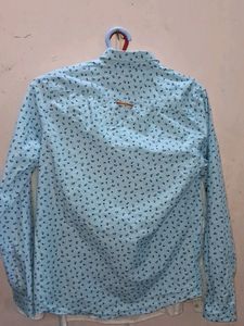 An INDIAN TERRIAN SHIRT BOYS