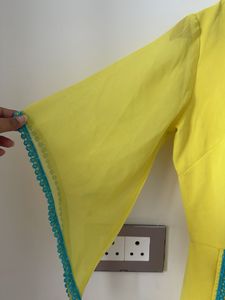 Vibrant Yellow jumpsuit with Teal Trim
