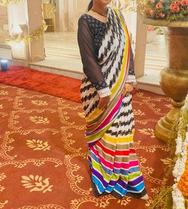 Vibrant Striped Saree with Geometric Blouse