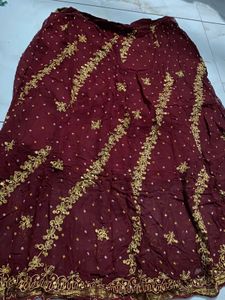 Exquisite Maroon &amp; Gold Embellished Lehenga Choli