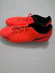Bright Orange Rike Soccer Cleats