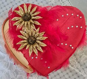 Red heart shaped satin box