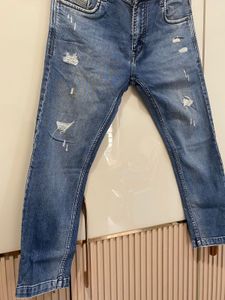 Distressed Denim Jeans