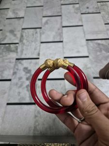 Red Bangles with Gold Accents