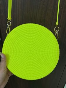 never used Neon Round Crossbody Bag
