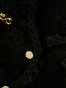 Chic Black Vest with Gold Embellishments