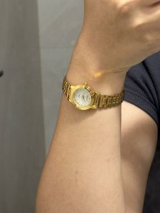 classic vintage gold analog watch