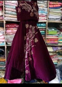 bust 40 Elegant Maroon Embroidered Lehenga Set