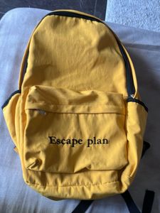Yellow Backpack with "Escape plan" Text