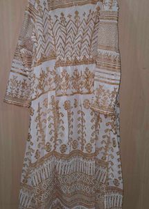 Green Embroidered Maxi Dress with golden jacket
