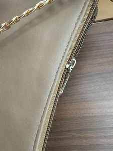 Chic Tan Shoulder Bag with Chain Detail
