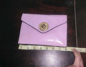 Sling Bag with Detachable Strap.