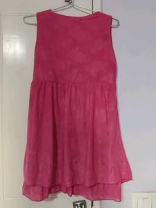 Chic Pink Sleeveless Top with Floral Accent