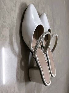 White Heels with Sparkling Rhinestone Strap.
