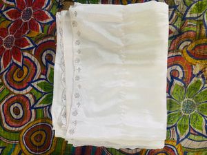 Elegant White Saree with Pink Accent