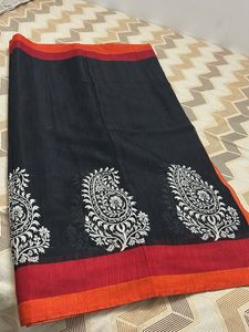 Elegant Black Saree with White Paisl