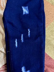 Ripped Blue Jeans