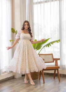 Chic Floral Tiered Midi Dress with Puff Sleeves
