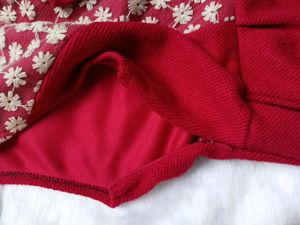 Free Delivery red dress with lace and bow detail.
