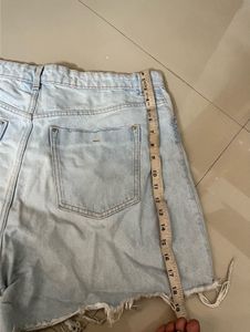 Distressed Light Wash Denim Shorts