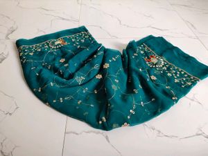 Exquisite Teal Peacock Embroidered Saree